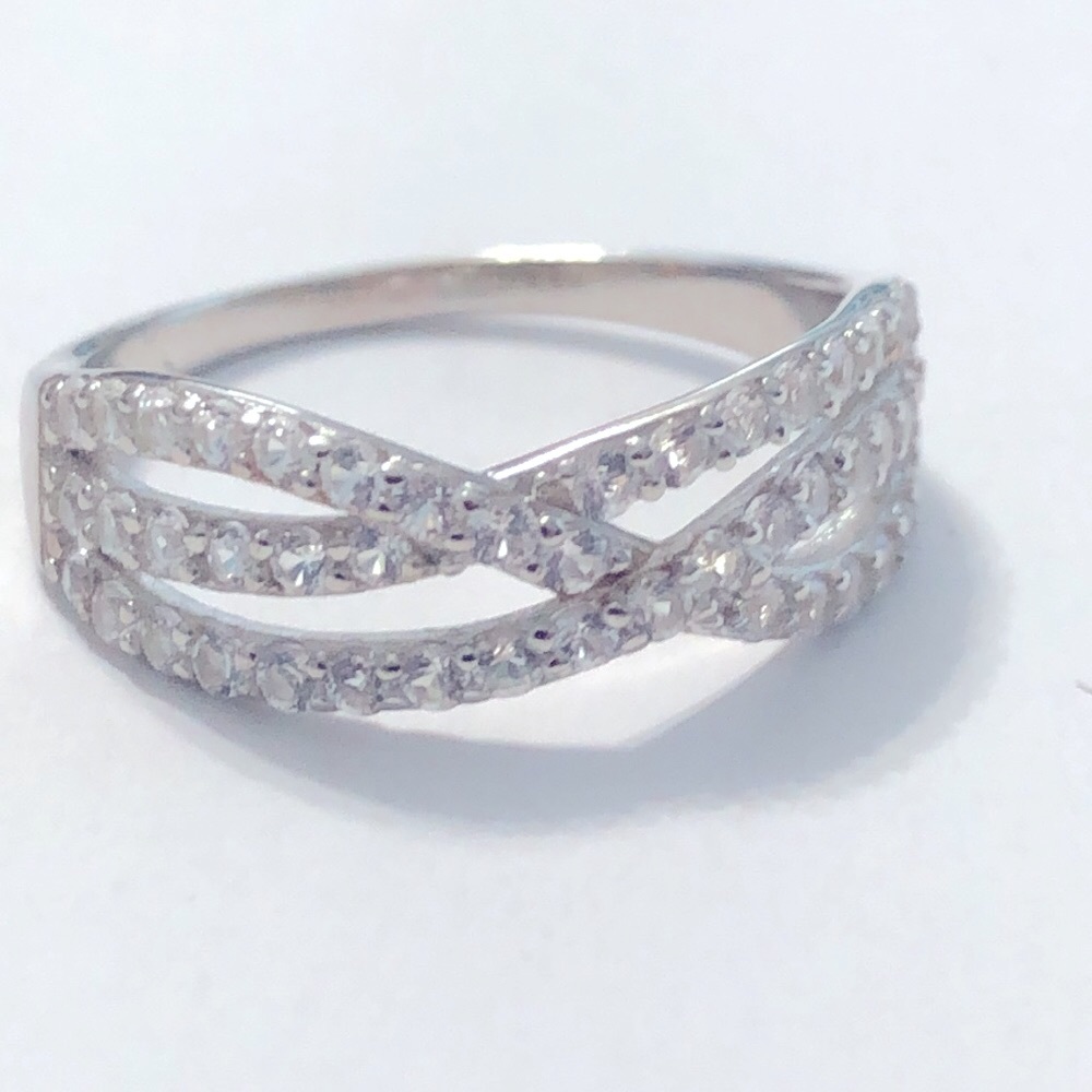 Size 7 white sapphire s.s. Crossover ring